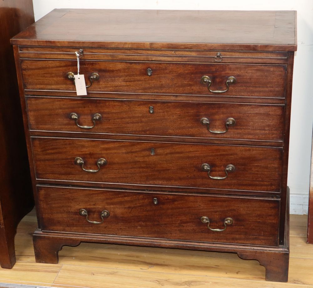A George III mahogany chest with false front brushing slide, W.93cm, D.45cm, H.88cm